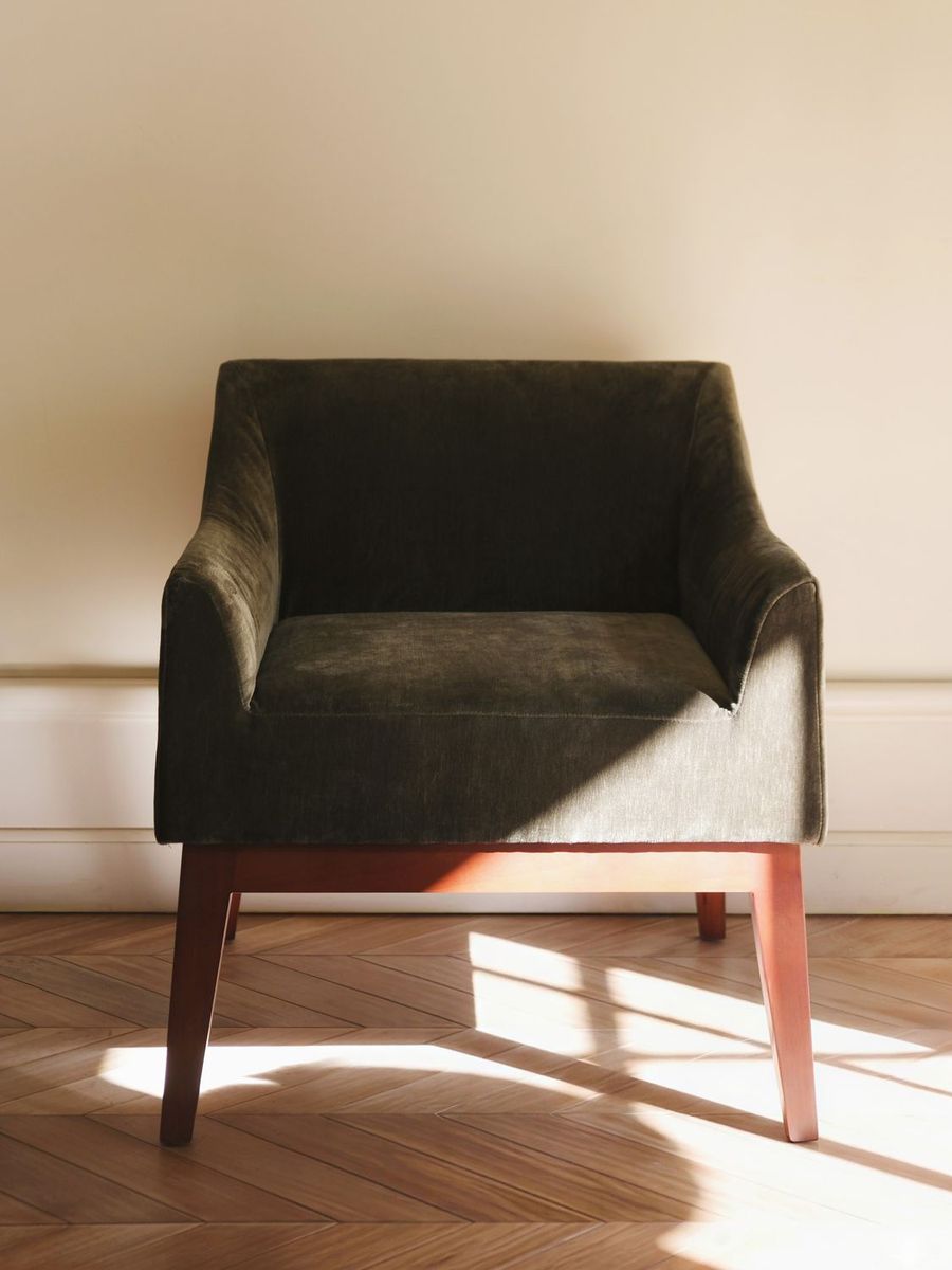 Detail of a solid-wood chair frame and upholstery